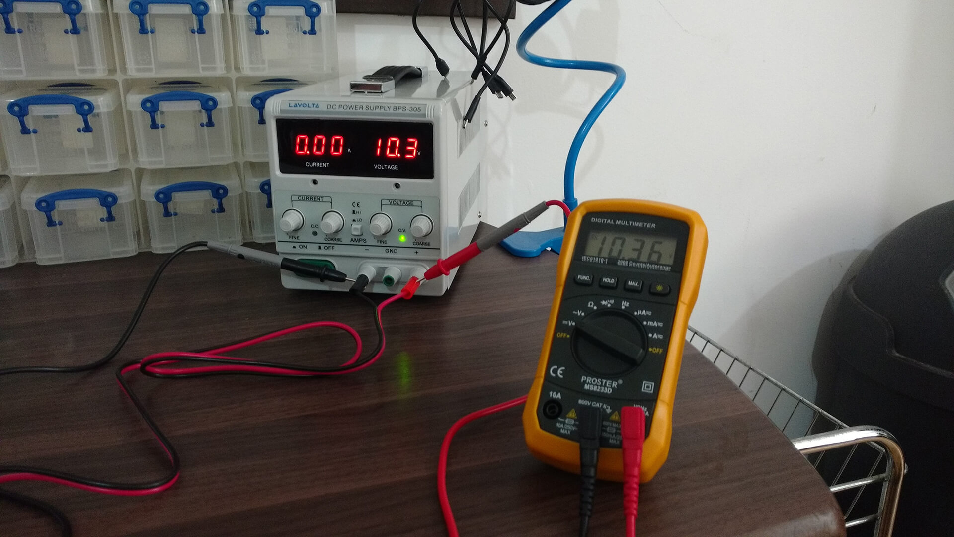 The new bench power supply connected to a multimeter