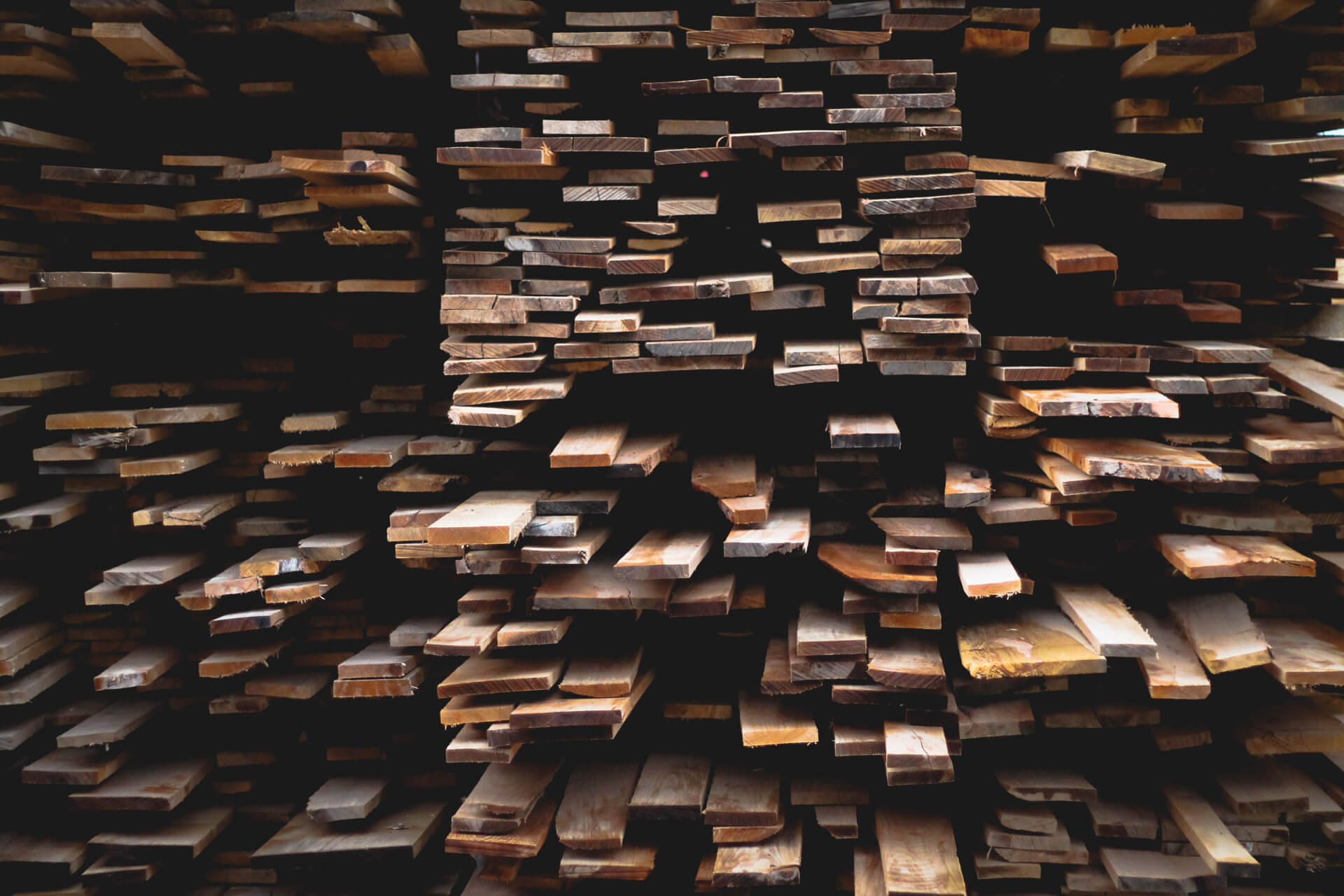 Stacks of rough-sawn timber planks