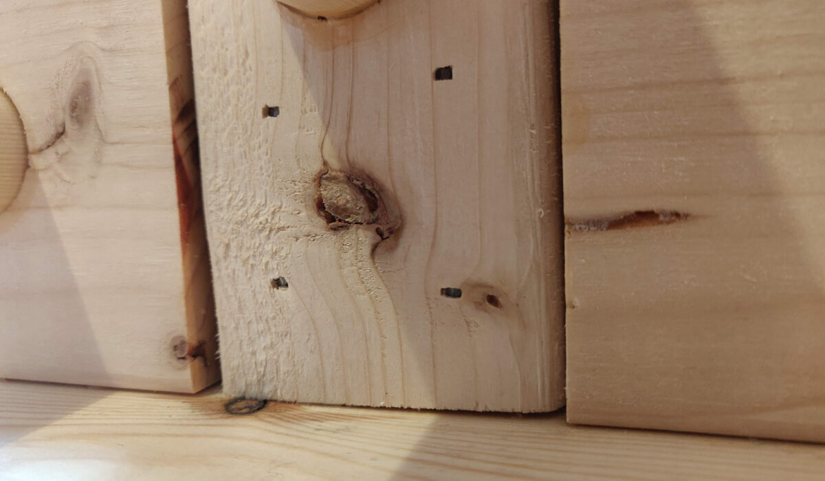 A lap joint cut too wide, leaving a gap beside the upright